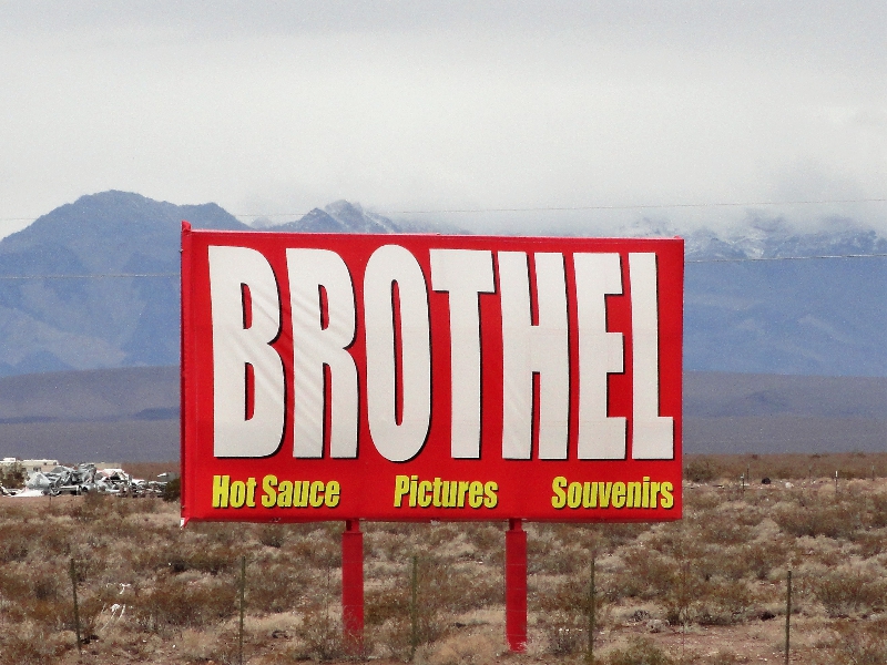November 11, 2013: Well, I was just minding my own business while driving through Nevada towards Las Vegas to attend the Latin Grammys when I suddenly came across this street sign. Am not sure what they are selling, probably Hot Sauce.