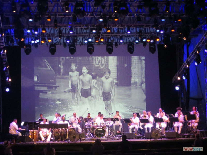 August 12, 2018: We love New York City in the summer! This evening, we saw drummer Bobby Sanabria and his Multiverse Big Band performing their virtuosic, latin-jazzy take on West Side Story, at the outdoor Damrosch Park band shell at Lincoln Center. What a blast!